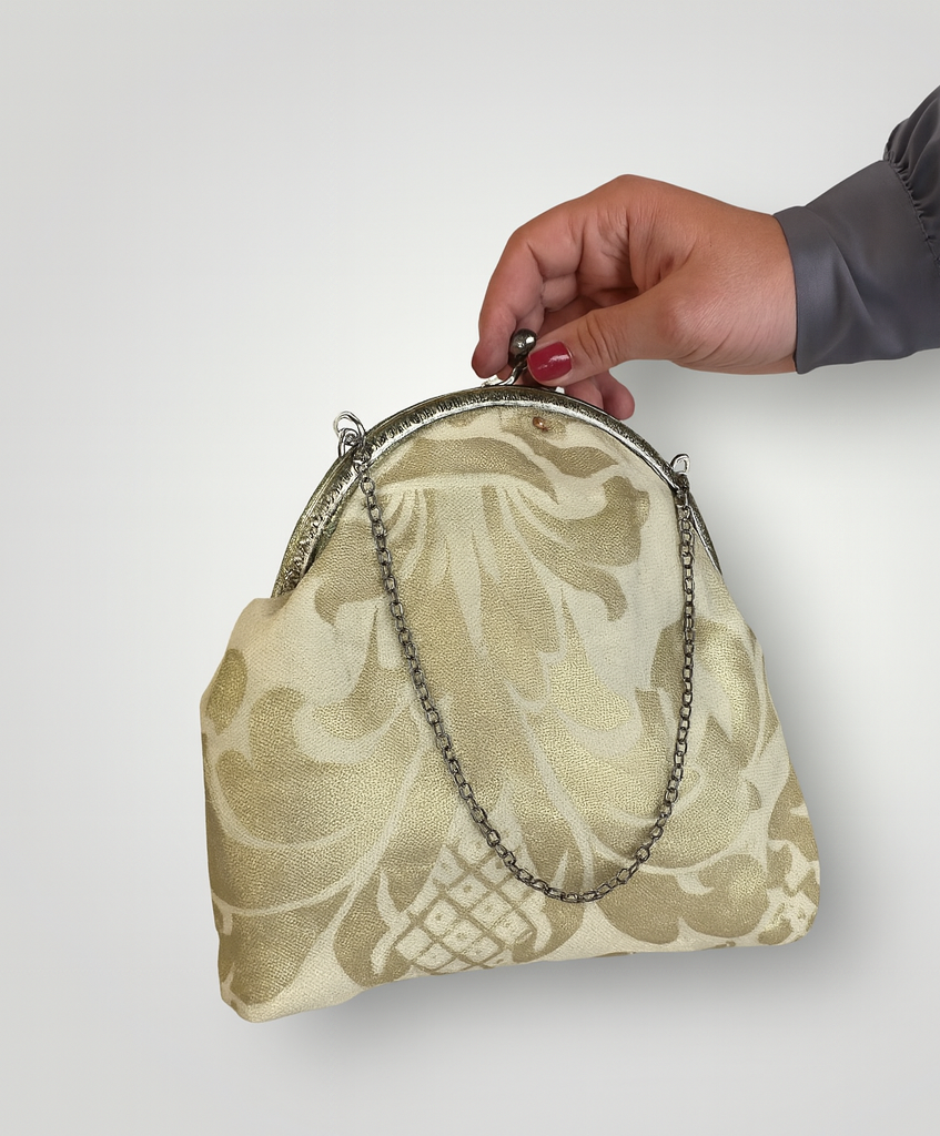 "Luxury bag" click clack panna-oro