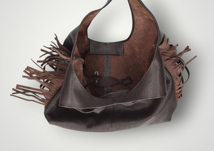 Borsa in pelle sfoderata con frange laterali
